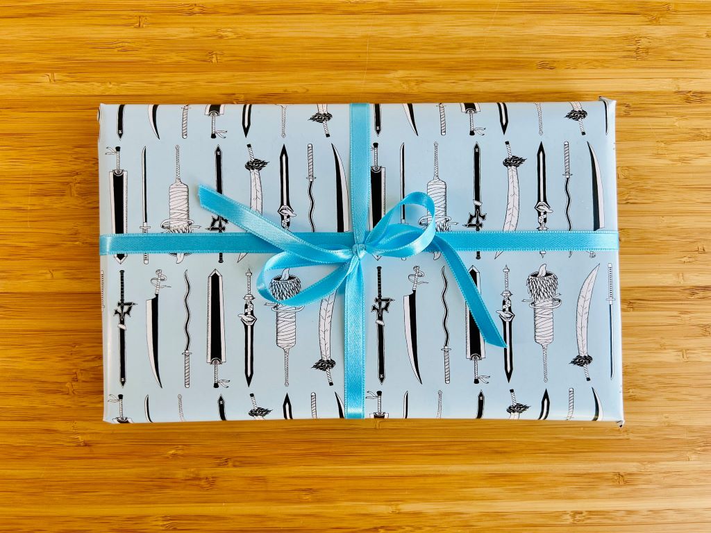 Balící papír "Anime meče" 475 x 680 mm